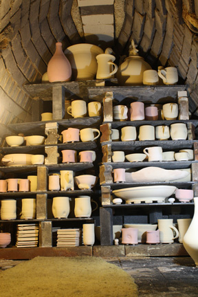 stacking the shelves in Jay Widmer's anagama kiln